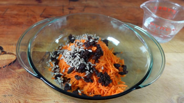 fermented carrot salad ingredients in bowl